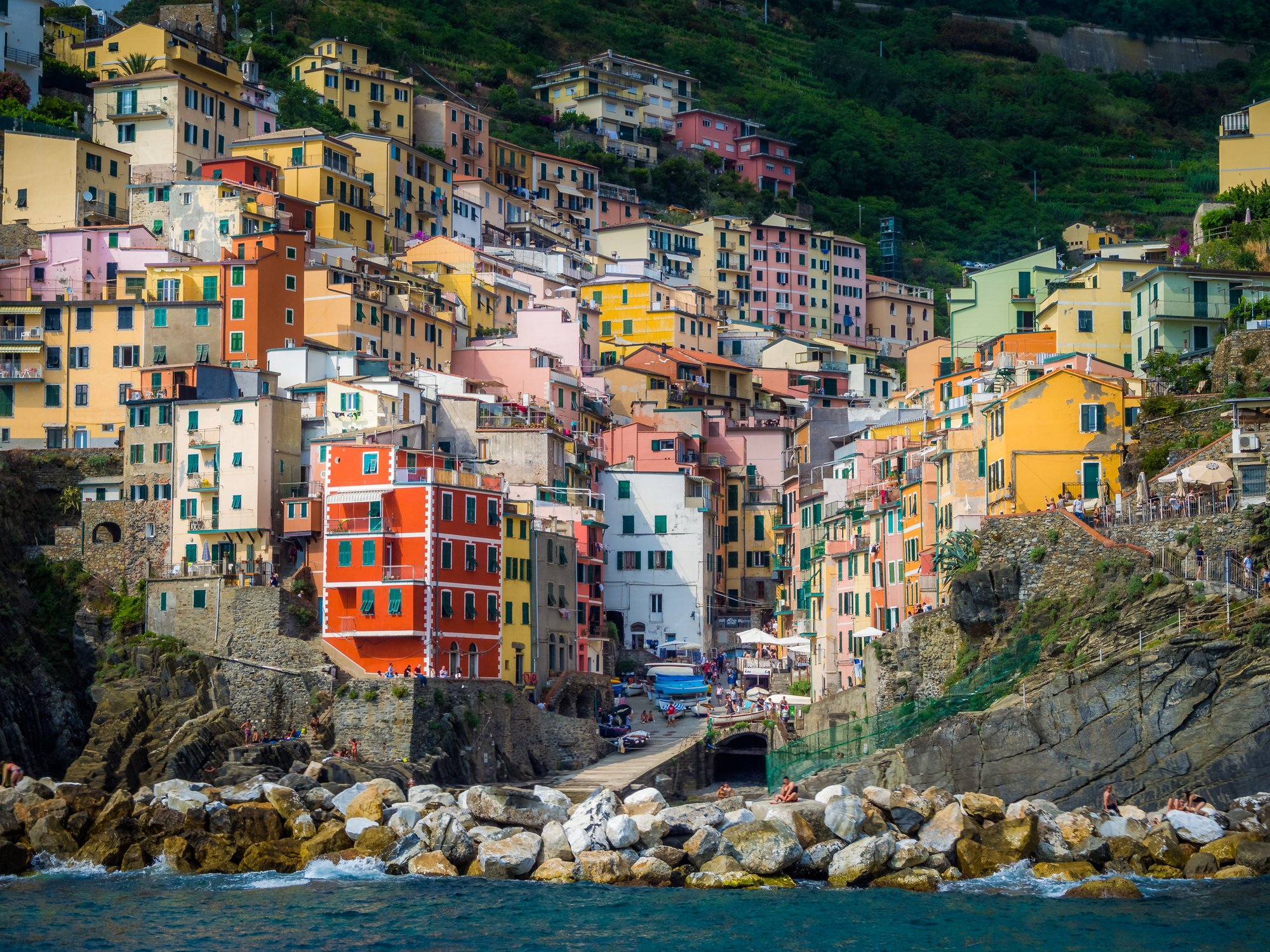 closeup-colorful-houses-coastal-village-riomaggiore-italy closeup-colorful-houses-coastal-village-riomaggiore-italy